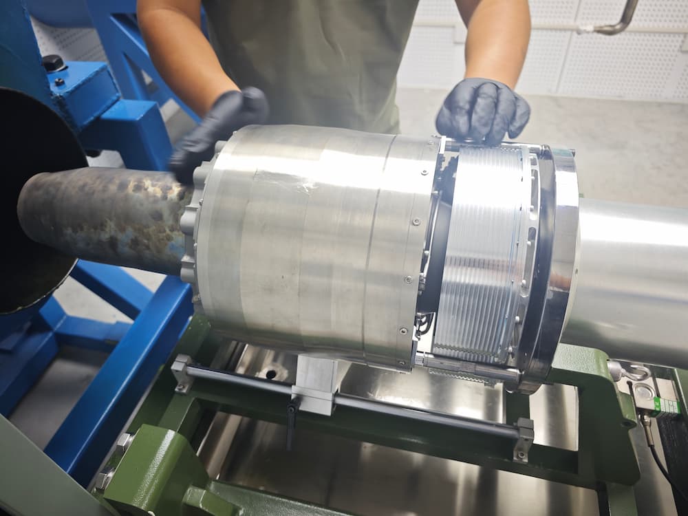 Foreign customers visit our company's drone turbojet engine operating  outdoors